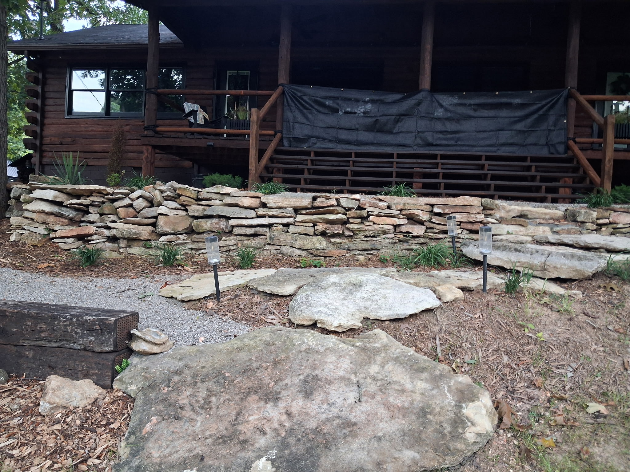 Dry-stacked stone retaining wall and steps