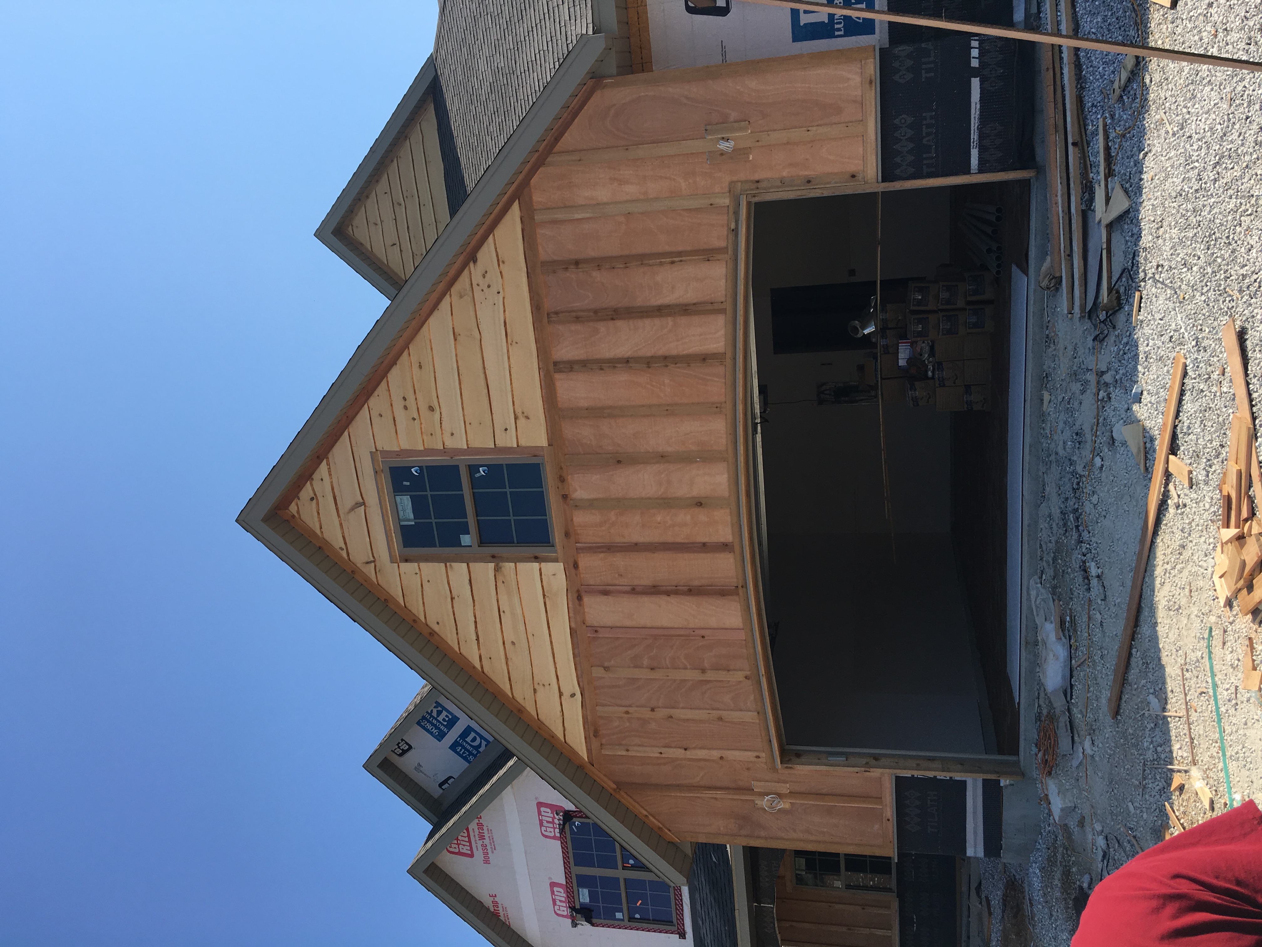 New construction garage with cedar siding