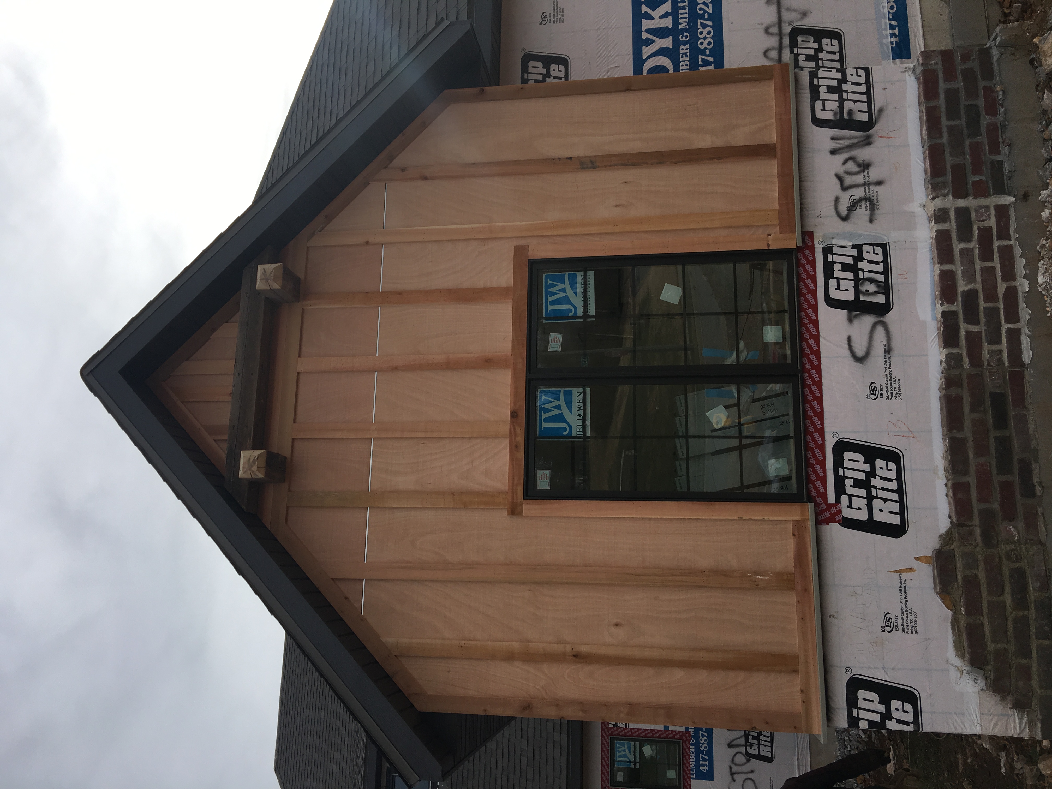 Gable end with cedar siding and window