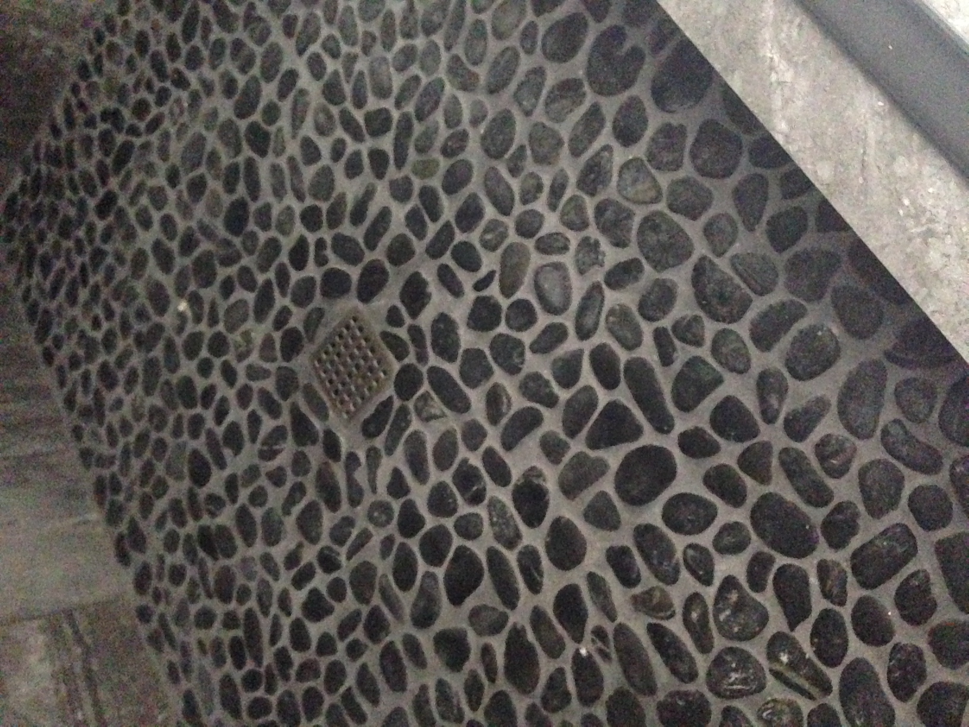 Pebble tile shower floor