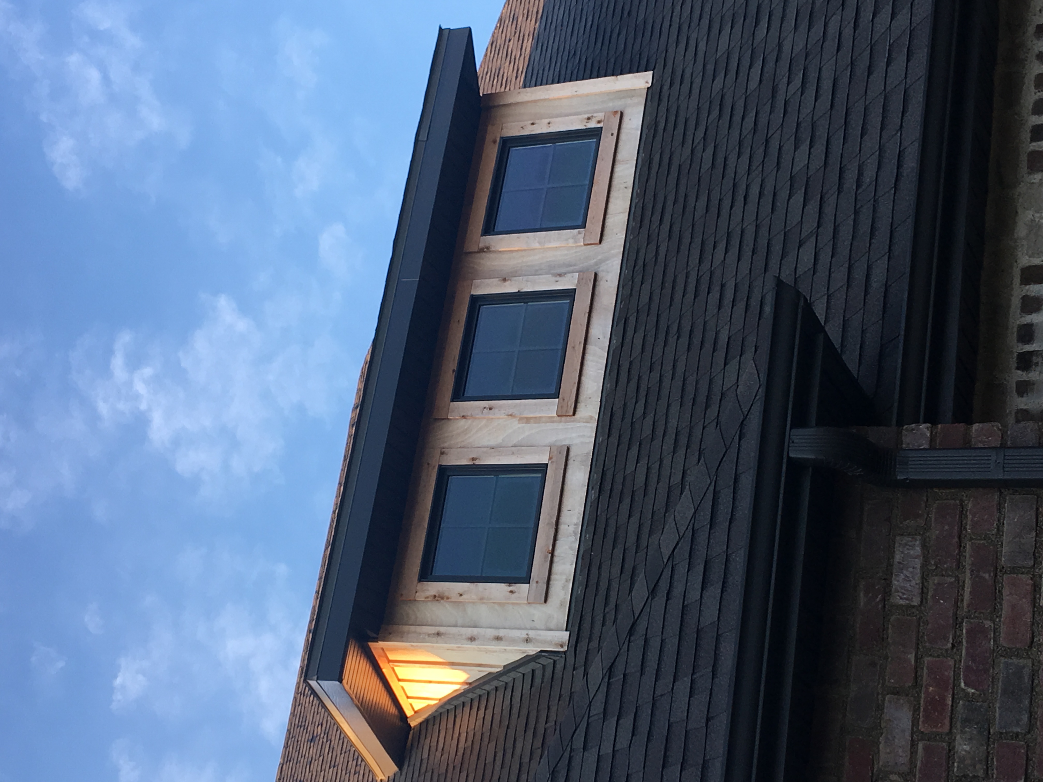 Finished dormer with trim carpentry